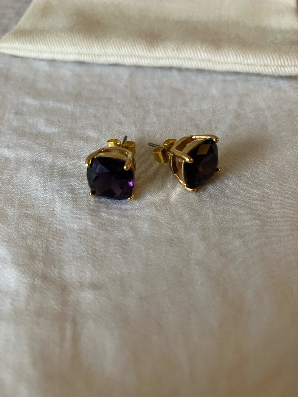 Kate Spade: Gold-Plated Stud Earrings with Purple Cushion-Cut Stones- dust bag